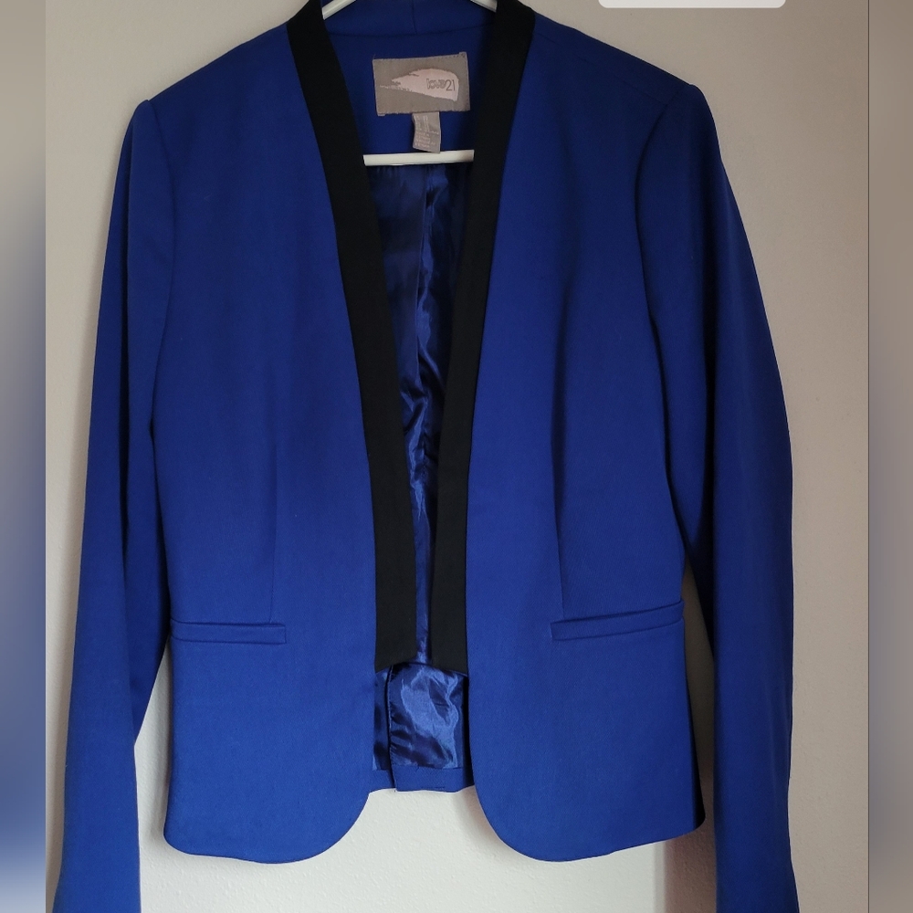 Beautiful blue blazer with a black trim